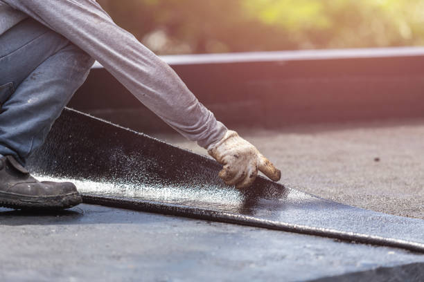 Professional Emergency Waterproofing technician working in Bloomington, MN